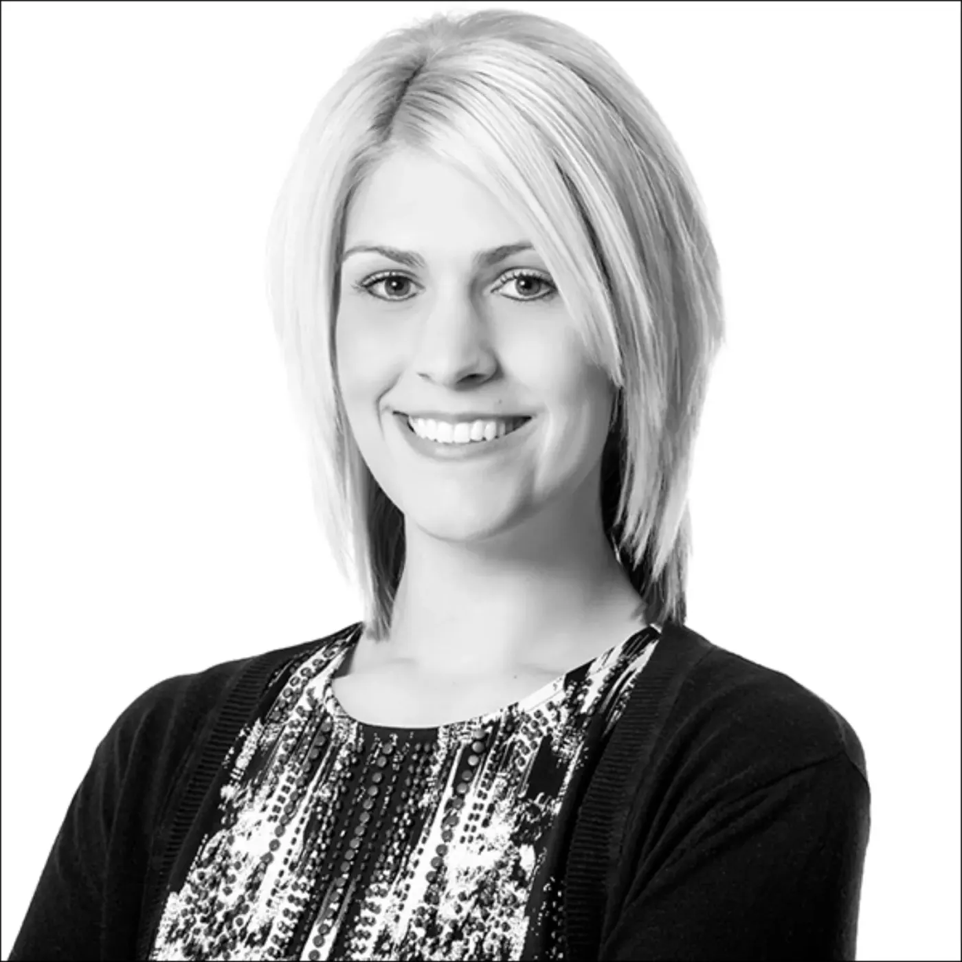 Black-and-white team headshot photographed for Christie Paul Hair, Leighton Buzzard