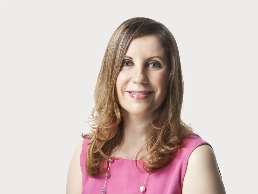 Team headshot photographed for Oliver Wyman