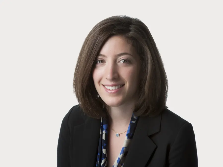 Team headshot photographed for Oliver Wyman